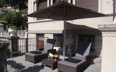 Zarina: Furniture, Outdoor Furniture, Chair, Flowerpot, Umbrella, Outdoor Table, Houseplant, Shade, Patio, Balcony