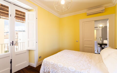 Interno Sorrentino: Bedroom, Interior Design, Yellow, Bed, Wood, Floor, Flooring, Bed Sheet, Ceiling, Bedding