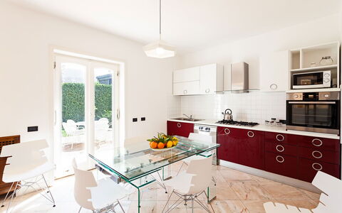 Villa Orlando: Furniture, Interior Design, Flooring, Wood, Floor, Room, Table, Kitchen, Ceiling, Lighting