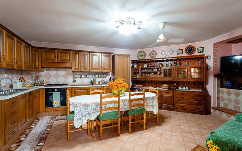 Villa Due Golfi: Furniture, Interior Design, Cabinetry, Wood, Ceiling, Flooring, Kitchen, Room, Cupboard, Floor