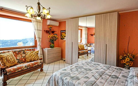 Villa Due Golfi: Furniture, Interior Design, Bed, Bedroom, Room, Wood, Flooring, Floor, Bed Sheet, Ceiling
