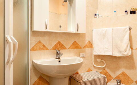Villa Due Golfi: Interior Design, Floor, Flooring, Wood, Plumbing Fixture, Bathroom Sink, Toilet, Toilet Seat, Sink, Bathroom