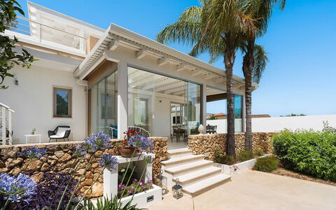 Sun Stone: Home, Porch, Residential Area, Estate, Balcony, Door, Shade, Resort, Column, Eco Hotel