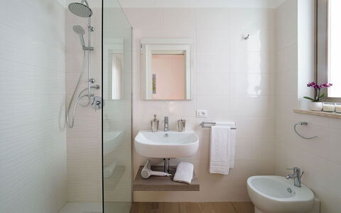 Sun Stone: Bathroom, Plumbing Fixture, Interior Design, Wall, Bathroom Sink, Flooring, Floor, Sink, Toilet, Tap