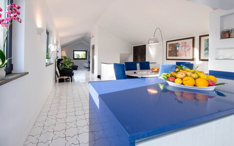 The Ivy Penthouse: Blue, Interior Design, Flooring, Floor, Ceiling, Kitchen, Furniture, Tile, Countertop, Room