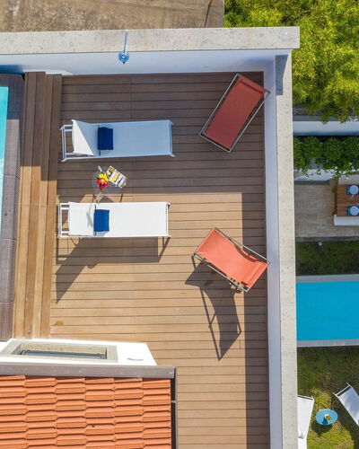 The Ivy Penthouse: Swimming Pool, Composite Material, Leisure, Outdoor Furniture, Resort, Wood Stain, Eco Hotel, Shade, Chair, Deck