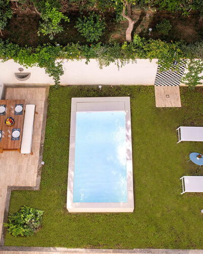 Jacaranda House: Swimming Pool, Outdoor Furniture, Resort, Garden, Leisure, Water Feature, Backyard, Courtyard, Eco Hotel, Landscaping