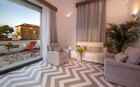 Suite Agave: Furniture, Flooring, Interior Design, Floor, Apartment, Chair, Couch, Living Room, Flowerpot