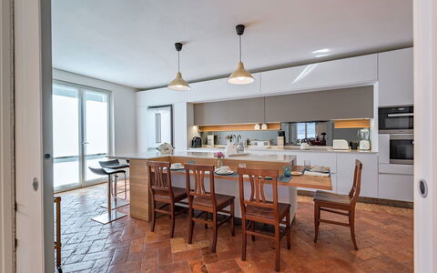 Villa Angela: Furniture, Interior Design, Flooring, Kitchen, Countertop, Floor, Wood, Chair, Ceiling, Kitchen & Dining Room Table