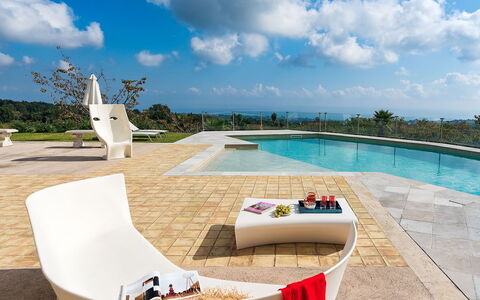 Villa Magical Tower: Furniture, Outdoor Furniture, Chair, Resort, Swimming Pool, Shade, Eco Hotel, Umbrella, Leisure, Sunlounger