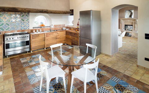 Villa Magical Tower: Furniture, Flooring, Interior Design, Floor, Kitchen, Wood, Countertop, Chair, Lighting, Tile
