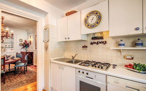 Villa Martina: Flooring, Kitchen, Major Appliance, Interior Design, Kitchen Appliance, Countertop, Floor, Cabinetry, Room, Lighting