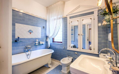 Villa Martina: Blue, Plumbing Fixture, Interior Design, Flooring, Bathroom, Floor, Bathroom Sink, Tap, Bathtub, Plumbing