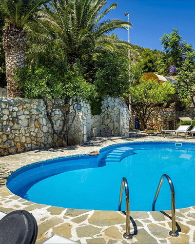 Villa Jamie: Blue, Swimming Pool, Outdoor Furniture, Resort, Furniture, Eco Hotel, Flagstone, Shade, Chair, Leisure