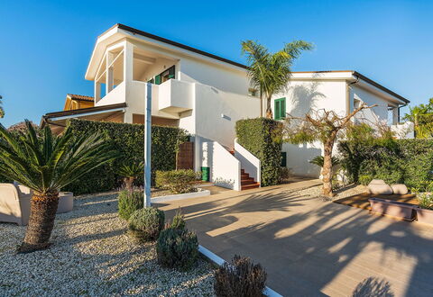 Ninfa: Building, Residential Area, House, Home, Architecture, Facade, Shrub, Roof, Estate