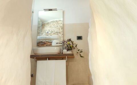 Villa la Rezza: Wall, Interior Design, Room, Ceiling, Linens, Natural Material, Houseplant, Plumbing Fixture, Wood Stain, Bedroom