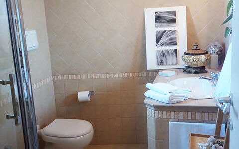 Villa la Rezza: Flooring, Floor, Toilet Seat, Wall, Plumbing Fixture, Bathroom, Toilet, Interior Design, Plumbing, Tile