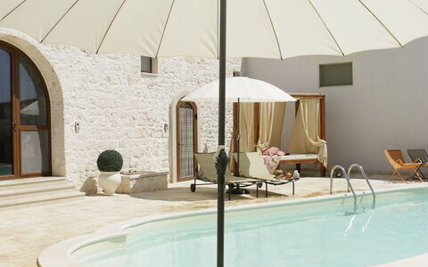 Masseria San Michele: Umbrella, Outdoor Furniture, Shade, Sunlounger, Chair, Outdoor Table, Design, Swimming Pool, Patio