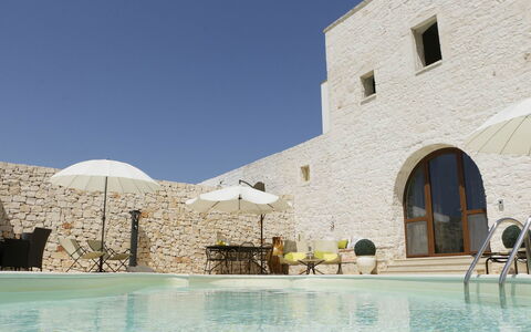 Masseria San Michele: Wall, Outdoor Furniture, Estate, Swimming Pool, Stone Wall, Villa, Flagstone, Hacienda, Sunlounger, Caravanserai