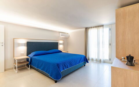 La Rosa dei Venti: Interior Design, Flooring, Furniture, Floor, Apartment, Resort, Room, Ceiling, Bed, Bedroom