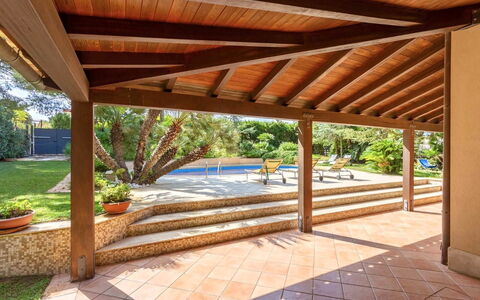 Villa Acquamarina: Wood, Flooring, Floor, Ceiling, Shade, Resort, Beam, Wood Stain, Porch, Outdoor Structure