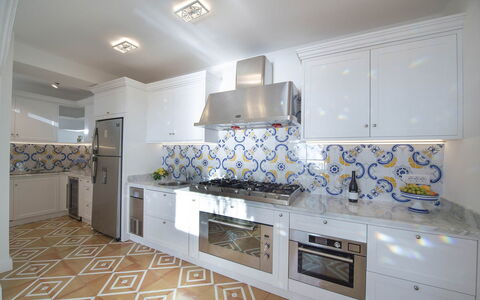 Villa Melissa: Blue, Kitchen, Flooring, Interior Design, Kitchen Stove, Floor, Major Appliance, Tile, Countertop, Kitchen Appliance