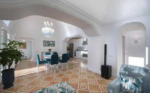 Villa Melissa: Interior Design, Furniture, Flooring, Floor, Ceiling, Couch, Living Room, Lighting, Table, Architecture