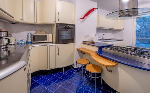 Villa Grazia: Kitchen, Flooring, Interior Design, Countertop, Floor, Kitchen Appliance, Major Appliance, Ceiling, Furniture, Lighting