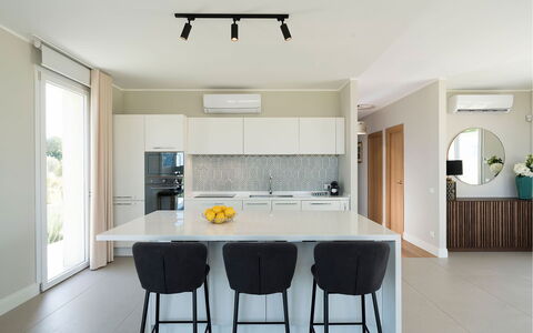 Green Hill: Furniture, Interior Design, Flooring, Floor, Kitchen, Chair, Light Fixture, Kitchen & Dining Room Table, Countertop, Wood