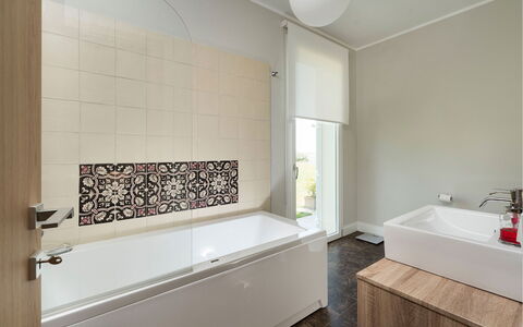 Green Hill: Bathtub, Flooring, Plumbing Fixture, Bathroom, Floor, Interior Design, Tap, Plumbing, Tile, Room