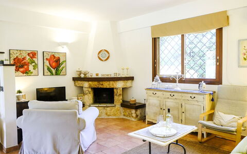 Villa Virna: Furniture, Interior Design, Flooring, Floor, Wood, Room, Ceiling, Table, Lighting, Living Room