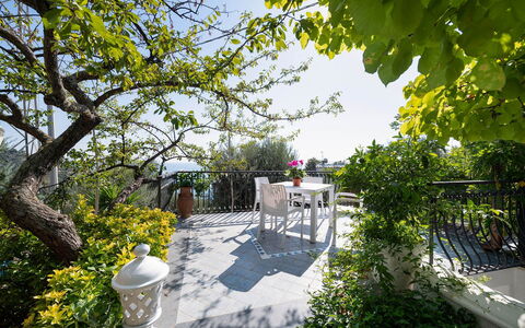 Villa Eva: Furniture, Chair, Spring, Garden, Shade, Outdoor Furniture, Flowerpot, Landscaping, Yard