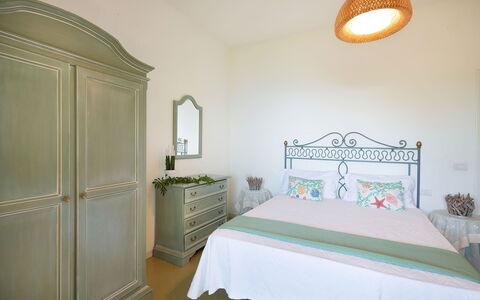 Villa Eva: Furniture, Interior Design, Bedroom, Bed, Room, Floor, Flooring, Lighting, Bedding, Linens