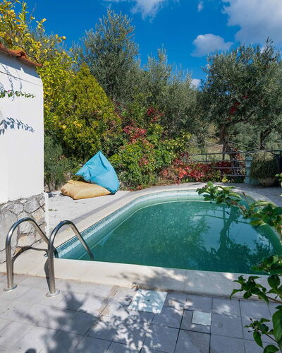 Villa Eva: Blue, Swimming Pool, Garden, Backyard, Shade, Water Feature, Landscaping, Outdoor Furniture, Resort, Eco Hotel