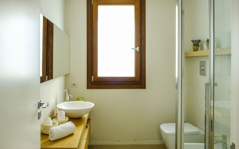 Villa Adriana: Bathroom, Flooring, Wall, Plumbing Fixture, Bathroom Sink, Floor, Wood, Interior Design, Mirror, Sink