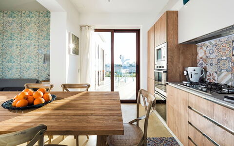 Villa Orietta: Furniture, Flooring, Interior Design, Floor, Wood, Kitchen, Kitchen & Dining Room Table, Room, Home, Countertop