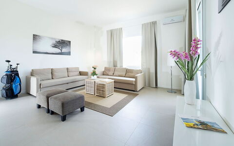 Villa Emma: Furniture, Interior Design, Couch, Flooring, Floor, Living Room, Wood, Table, Room, Ceiling