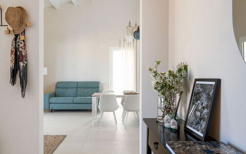 Villa Bruna: Furniture, Interior Design, Flooring, Wall, Floor, Wood, Room, Lighting, Living Room, Home
