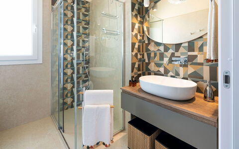 Villa Bruna: Interior Design, Flooring, Bathroom, Plumbing Fixture, Floor, Lighting, Furniture, Tile, Plumbing, Home