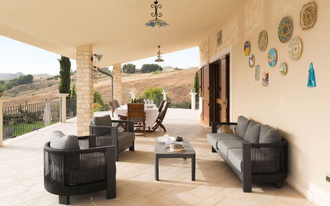 Villa Carousel: Furniture, Flooring, Chair, Interior Design, Floor, Table, Outdoor Furniture, Couch, Living Room, Home