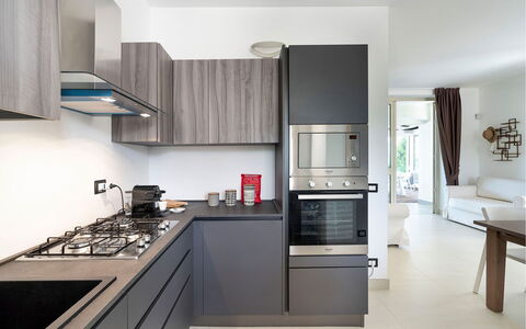 Villa Sea Star: Kitchen, Kitchen Appliance, Countertop, Major Appliance, Cabinetry, Interior Design, Kitchen Stove, Furniture, Home Appliance, Flooring
