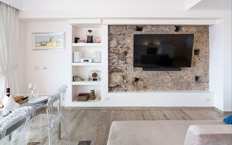 Casa Light Blu: Wall, Interior Design, Flooring, Wood, Furniture, Floor, Ceiling, Living Room, Lighting, Apartment
