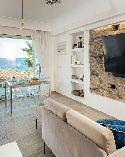 Casa Light Blu: Furniture, Interior Design, Flooring, Floor, Sea, Apartment, Coast, Room, Living Room, Ocean
