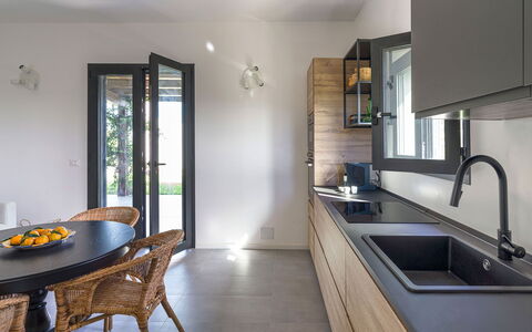 Villa Arcobaleno: Furniture, Interior Design, Countertop, Flooring, Kitchen, Wood, Home, Cabinetry, Lighting, Floor