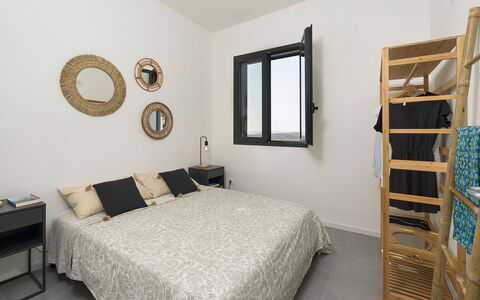 Villa Arcobaleno: Bed, Bedroom, Furniture, Wall, Interior Design, Bedding, Bed Sheet, Wood, Floor, Linens