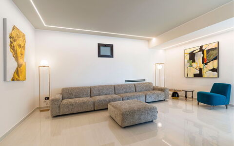 Villa Zafferano: Furniture, Interior Design, Flooring, Wall, Floor, Couch, Ceiling, Wood, Living Room, Lighting