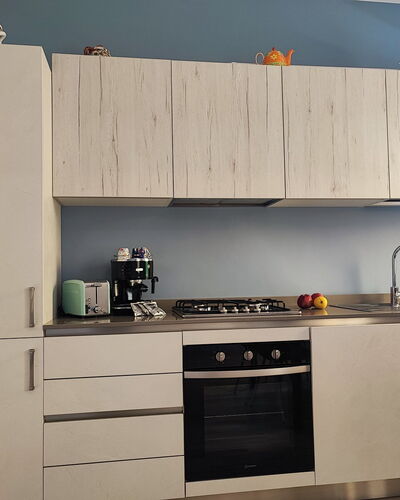 Casa Nadia: Wood, Furniture, Kitchen Appliance, Flooring, Kitchen, Cabinetry, Countertop, Major Appliance, Interior Design, Home Appliance