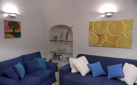 Casa Minori: Furniture, Blue, Couch, Wall, Interior Design, Living Room, Cushion, Flooring, Throw Pillow