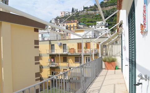 Casa Minori: Apartment, Balcony, Urban Design, Composite Material, Condominium, Metal, Handrail, Daylighting