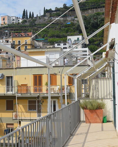 Casa Minori: Apartment, Neighbourhood, Residential Area, Balcony, Urban Design, Composite Material, Condominium, Handrail, Daylighting